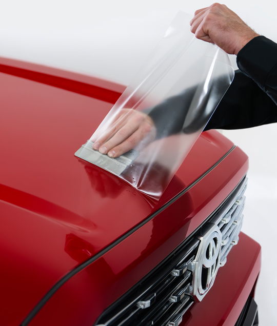 TOYOTA ACCESSORIES BEING INSTALLED RED TRUCK