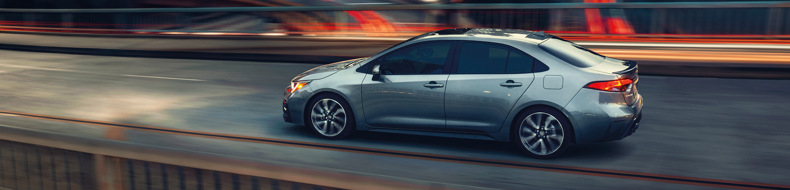 2026 Toyota Corolla driving down street